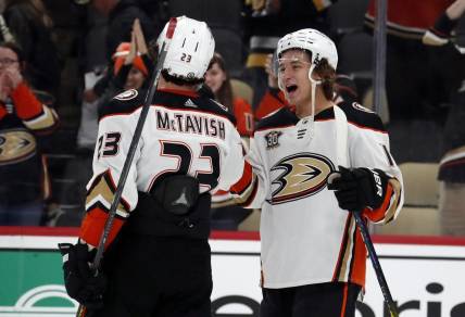 Oct 30, 2023; Pittsburgh, Pennsylvania, USA;  Anaheim Ducks center Mason McTavish (23) and center Trevor Zegras (right) celebrate after defeating the Pittsburgh Penguins at PPG Paints Arena.  Anaheim won 4-3. Mandatory Credit: Charles LeClaire-USA TODAY Sports