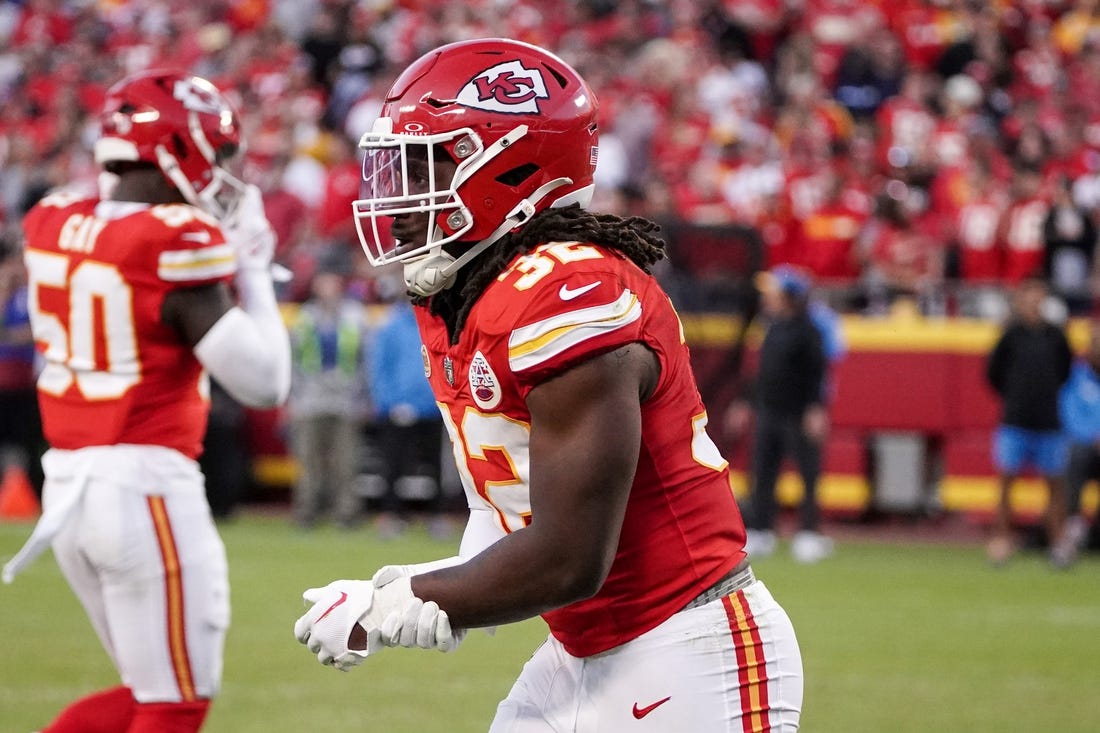 Oct 12, 2023; Kansas City, Missouri, USA; Kansas City Chiefs linebacker Nick Bolton (32) holds his wrist as he leaves the field against the Los Angeles Chargers during the game at GEHA Field at Arrowhead Stadium. Mandatory Credit: Denny Medley-USA TODAY Sports