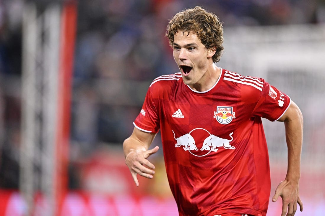 Nov 4, 2023; Harrison, NJ, USA; New York Red Bulls forward Tom Barlow (74) celebrates after scoring a goal during the second half against the FC Cincinnati of game two in a round one match of the 2023 MLS Cup Playoffs at Red Bull Arena. Mandatory Credit: Mark Smith-USA TODAY Sports