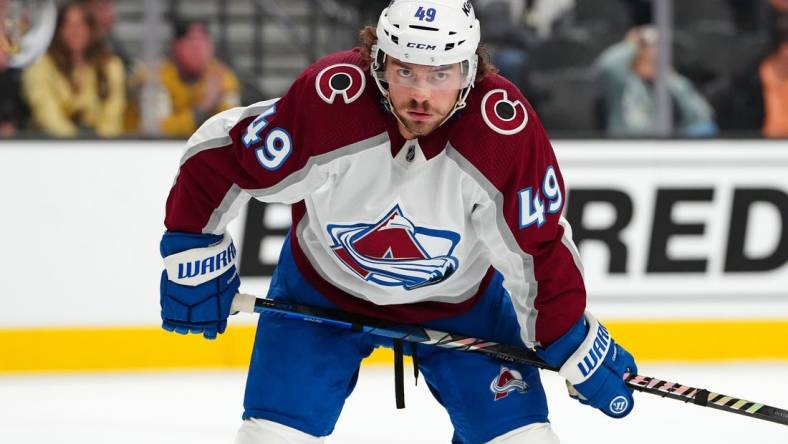 Nov 4, 2023; Las Vegas, Nevada, USA; Colorado Avalanche defenseman Samuel Girard (49) awaits a face off against the Vegas Golden Knights during the first period at T-Mobile Arena. Mandatory Credit: Stephen R. Sylvanie-USA TODAY Sports