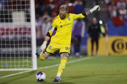 Nov 4, 2023; Frisco, Texas, USA; Seattle Sounders goalkeeper Stefan Frei (24) clears the ball during the second half of game two against FC Dallas in a round one match of the 2023 MLS Cup Playoffs at Toyota Stadium. Mandatory Credit: Andrew Dieb-USA TODAY Sports