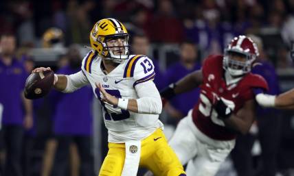 Nov 4, 2023; Tuscaloosa, Alabama, USA; LSU Tigers quarterback Garrett Nussmeier (13) throws  pass against the Alabama Crimson Tide during the second half at Bryant-Denny Stadium. Mandatory Credit: Butch Dill-USA TODAY Sports