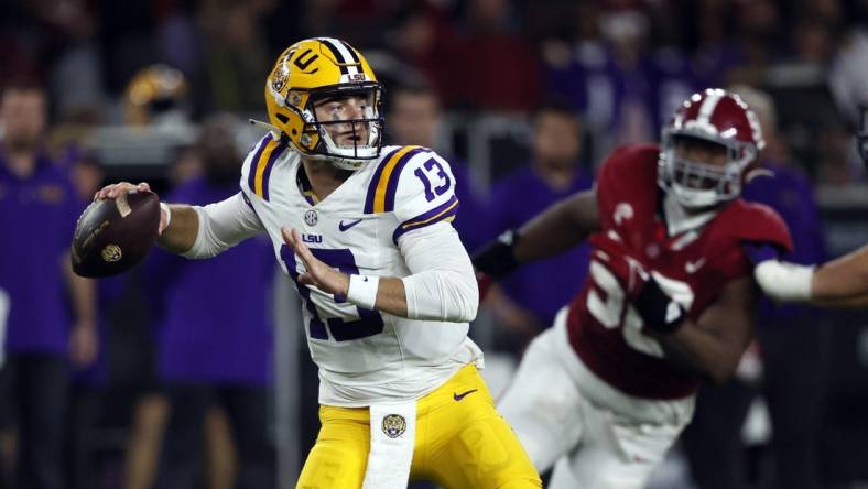 Nov 4, 2023; Tuscaloosa, Alabama, USA; LSU Tigers quarterback Garrett Nussmeier (13) throws  pass against the Alabama Crimson Tide during the second half at Bryant-Denny Stadium. Mandatory Credit: Butch Dill-USA TODAY Sports