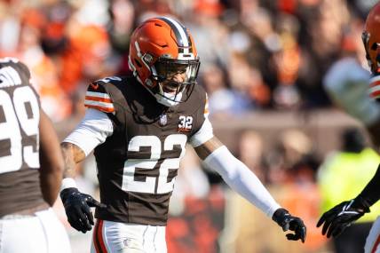 Nov 5, 2023; Cleveland, Ohio, USA; Cleveland Browns safety Grant Delpit (22) celebrates a third down stop against the Arizona Cardinals during the first quarter at Cleveland Browns Stadium. Mandatory Credit: Scott Galvin-USA TODAY Sports