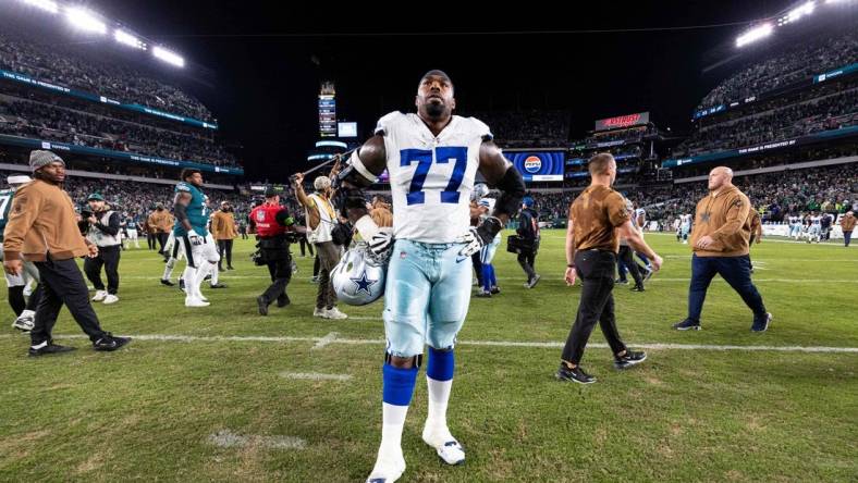 Nov 5, 2023; Philadelphia, Pennsylvania, USA; Dallas Cowboys offensive tackle Tyron Smith (77) looks on after a loss to the Philadelphia Eagles at Lincoln Financial Field. Mandatory Credit: Bill Streicher-USA TODAY Sports