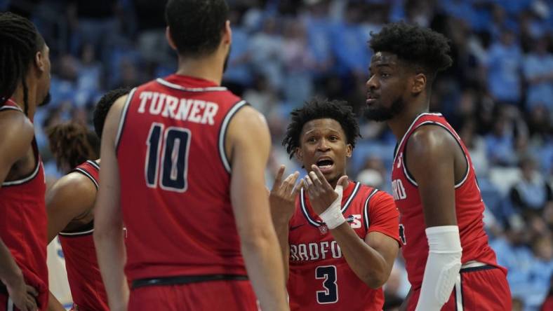 Nov 6, 2023; Chapel Hill, North Carolina, USA; Radford Highlanders guard Kenyon Giles (3) talks to the team in the huddle in the second half at Dean E. Smith Center. Mandatory Credit: Bob Donnan-USA TODAY Sports