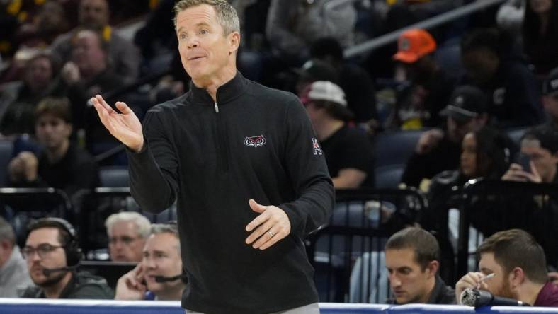 Nov 8, 2023; Chicago, Illinois, USA; Florida Atlantic Owls head coach Dusty May gesture to his team during the first half at Wintrust Arena. Mandatory Credit: David Banks-USA TODAY Sports