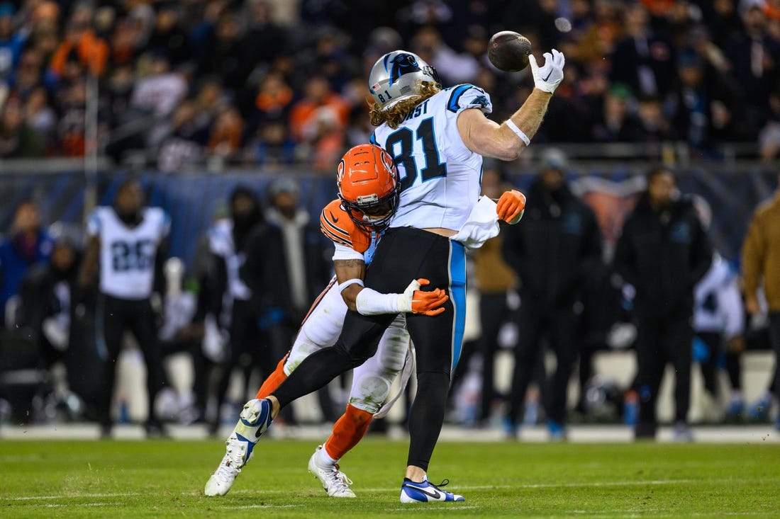 Nov 9, 2023; Chicago, Illinois, USA; Chicago Bears strong safety Jaquan Brisker (9) hits Carolina Panthers tight end Hayden Hurst (81) causing an incompletion during the fourth quarter at Soldier Field. Mandatory Credit: Daniel Bartel-USA TODAY Sports