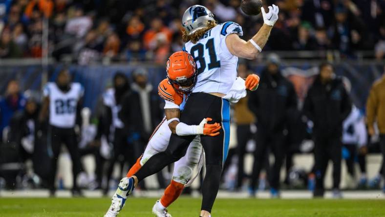 Nov 9, 2023; Chicago, Illinois, USA; Chicago Bears strong safety Jaquan Brisker (9) hits Carolina Panthers tight end Hayden Hurst (81) causing an incompletion during the fourth quarter at Soldier Field. Mandatory Credit: Daniel Bartel-USA TODAY Sports