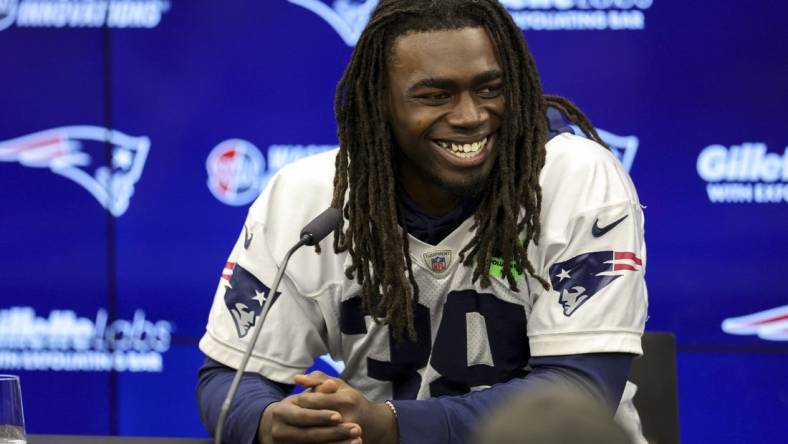 Nov 10, 2023; Frankfurt, Germany;  New England Patriots running back Rhamondre Stevenson (38) speaks to the media before an NFL International Series practice at the Deutcher Fussball-Bund facility. Mandatory Credit: Nathan Ray Seebeck-USA TODAY Sports