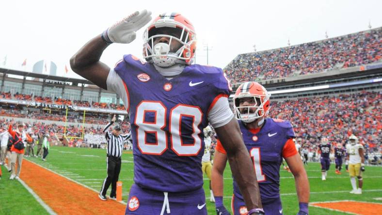 Nov 11, 2023; Clemson, South Carolina, USA; Clemson Tigers wide receiver Beaux Collins (80) salutes after scoring against the Georgia Tech Yellow Jackets during the second quarter at Memorial Stadium. Mandatory Credit: Ken Ruinard-USA TODAY Sports