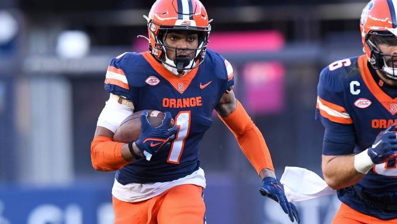 Nov 11, 2023; New York, New York, USA;  Syracuse Orange running back LeQuint Allen (1) runs with the ball against the Pittsburgh Panthers during the first half at Yankee Stadium. Mandatory Credit: Dennis Schneidler-USA TODAY Sports