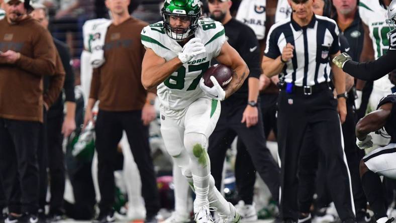 Nov 12, 2023; Paradise, Nevada, USA; New York Jets tight end C.J. Uzomah (87) runs the ball against the Las Vegas Raiders during the second half at Allegiant Stadium. Mandatory Credit: Gary A. Vasquez-USA TODAY Sports