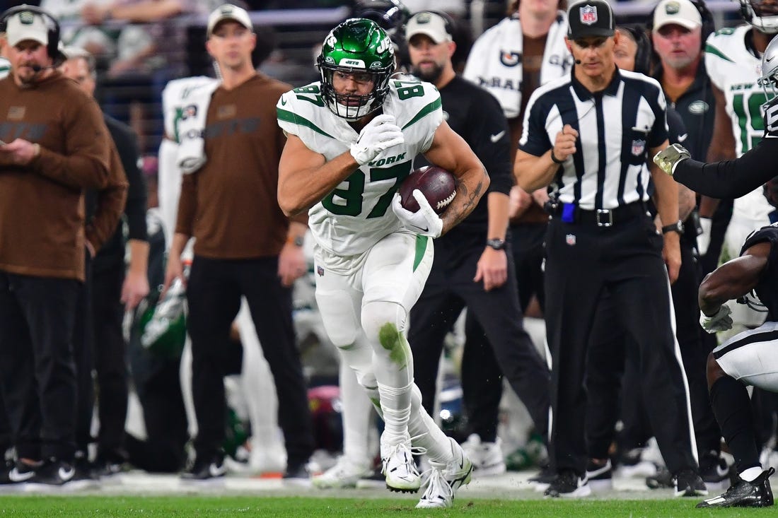 Nov 12, 2023; Paradise, Nevada, USA; New York Jets tight end C.J. Uzomah (87) runs the ball against the Las Vegas Raiders during the second half at Allegiant Stadium. Mandatory Credit: Gary A. Vasquez-USA TODAY Sports