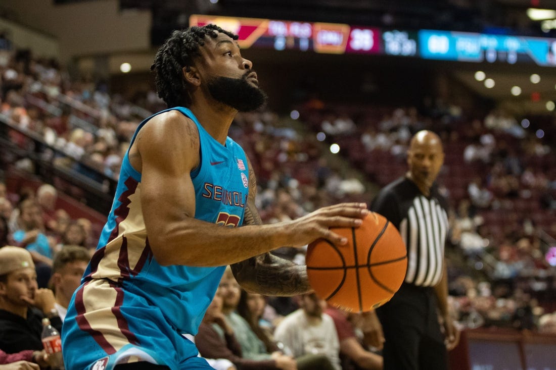 Florida State Seminoles guard Darin Green Jr. (22) shoots for three. The Florida State Seminoles hosted the Central Michigan Chippewas on Monday, Nov. 13, 2023.