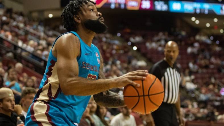 Florida State Seminoles guard Darin Green Jr. (22) shoots for three. The Florida State Seminoles hosted the Central Michigan Chippewas on Monday, Nov. 13, 2023.