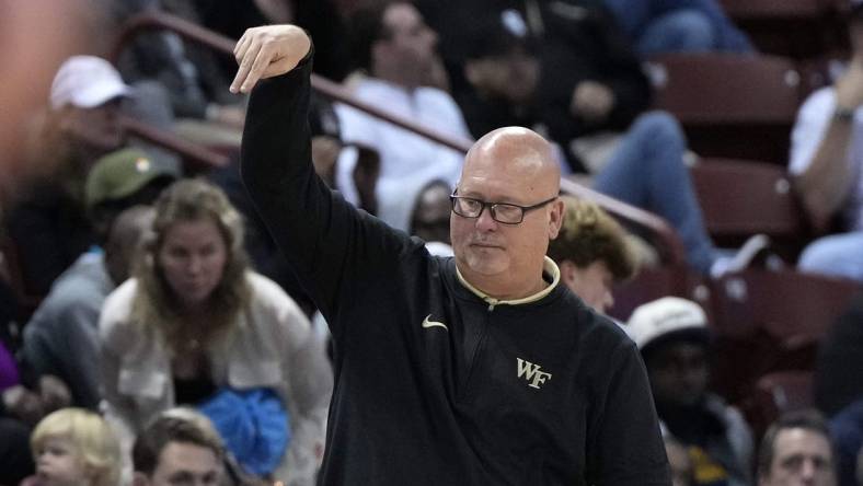 Nov 16, 2023; Charleston, South Carolina, USA; Wake Forest Demon Deacons head coach Steve Forbes reacts to play on the court in the second half against the Utah Utes at TD Arena. Mandatory Credit: David Yeazell-USA TODAY Sports