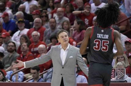 Nov 17, 2023; Charleston, SC, USA; St. John's Red Storm head coach Rick Pitino talks with St. John's Red Storm forward Glenn Taylor Jr. (35) in the first half at TD Arena. Mandatory Credit: David Yeazell-USA TODAY Sports