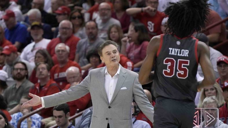 Nov 17, 2023; Charleston, SC, USA; St. John's Red Storm head coach Rick Pitino talks with St. John's Red Storm forward Glenn Taylor Jr. (35) in the first half at TD Arena. Mandatory Credit: David Yeazell-USA TODAY Sports