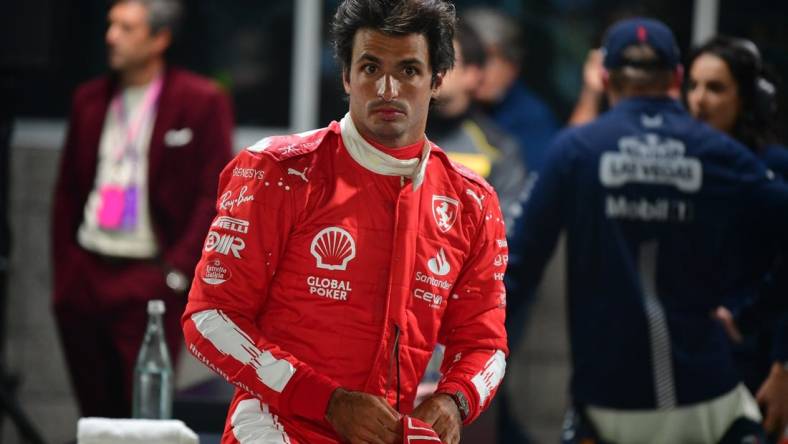 Nov 17, 2023; Las Vegas, Nevada, USA; Scuderia Ferrari driver Carlos Sainz Jr. of Spain (55) reacts after qualifying second at Las Vegas Strip Circuit. Mandatory Credit: Gary A. Vasquez-USA TODAY Sports