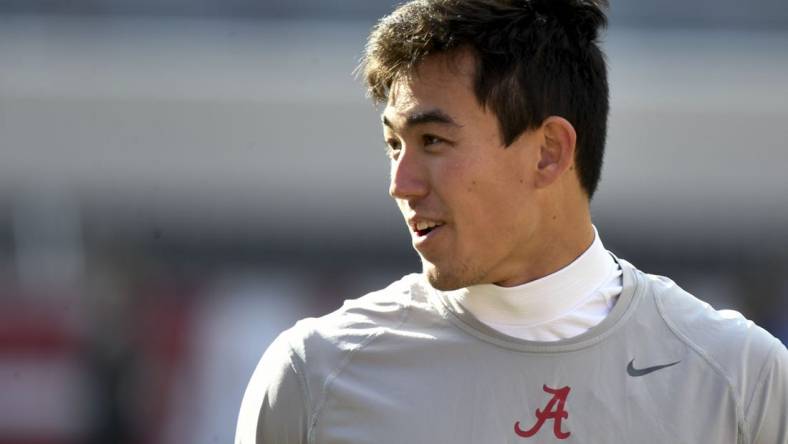 Nov 18, 2023; Tuscaloosa, Alabama, USA;  Alabama Crimson Tide quarterback Tyler Buchner (8) walks through his pregame warmup before the game with Chattanooga at Bryant-Denny Stadium. Mandatory Credit: Gary Cosby Jr.-USA TODAY Sports