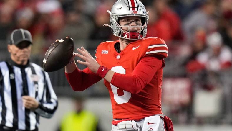 Nov 18, 2023; Columbus, Ohio, USA; Ohio State Buckeyes quarterback Kyle McCord (6) looks to pass during the NCAA football game against the Minnesota Golden Gophers at Ohio Stadium.