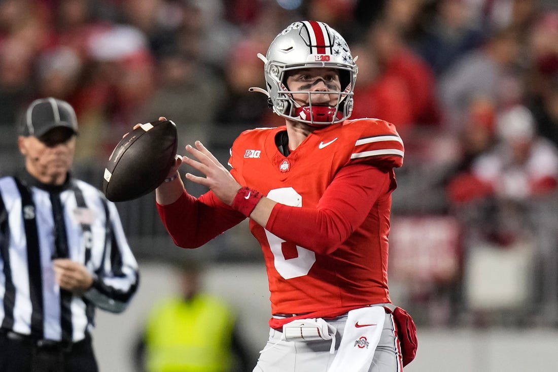 Nov 18, 2023; Columbus, Ohio, USA; Ohio State Buckeyes quarterback Kyle McCord (6) looks to pass during the NCAA football game against the Minnesota Golden Gophers at Ohio Stadium.