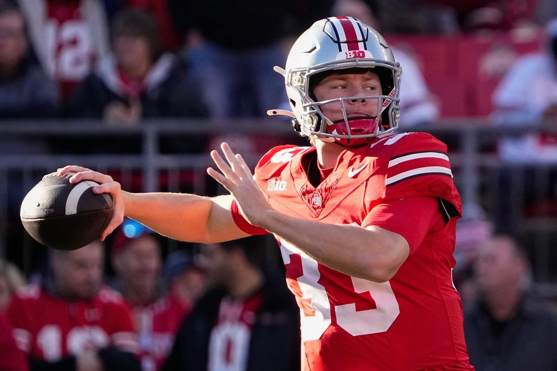 Nov 18, 2023; Columbus, Ohio, USA; Ohio State Buckeyes quarterback Devin Brown (33) throws during warm-ups prior to the NCAA football game against the Minnesota Golden Gophers at Ohio Stadium.