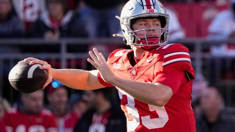 Nov 18, 2023; Columbus, Ohio, USA; Ohio State Buckeyes quarterback Devin Brown (33) throws during warm-ups prior to the NCAA football game against the Minnesota Golden Gophers at Ohio Stadium.