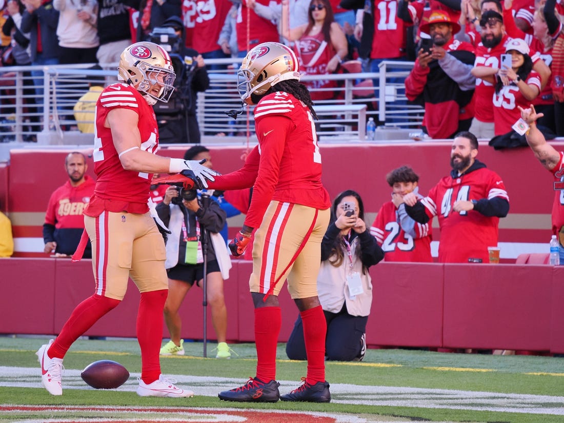 Nov 19, 2023; Santa Clara, California, USA; San Francisco 49ers wide receiver Brandon Aiyuk (11) celebrates with fullback Kyle Juszczyk (44) after scoring a 76-yard touchdown against the Tampa Bay Buccaneers during the third quarter at Levi's Stadium. Mandatory Credit: Kelley L Cox-USA TODAY Sports