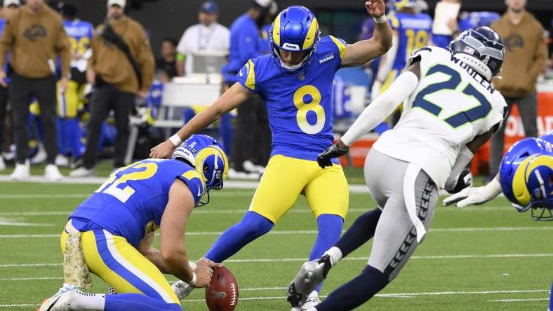 Nov 19, 2023; Inglewood, California, USA; Los Angeles Rams place kicker Lucas Havrisik (8) kicks a field goal in the fourth quarter against the Seattle Seahawks at SoFi Stadium. Mandatory Credit: Robert Hanashiro-USA TODAY Sports