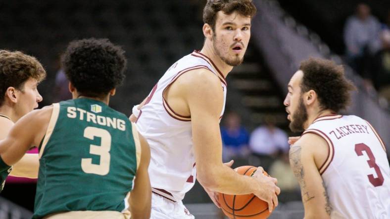 Nov 22, 2023; Kansas City, Missouri, USA; Boston College Eagles forward Quinten Post (12) looks to pass during the first half against the Colorado State Rams at T-Mobile Center. Mandatory Credit: William Purnell-USA TODAY Sports