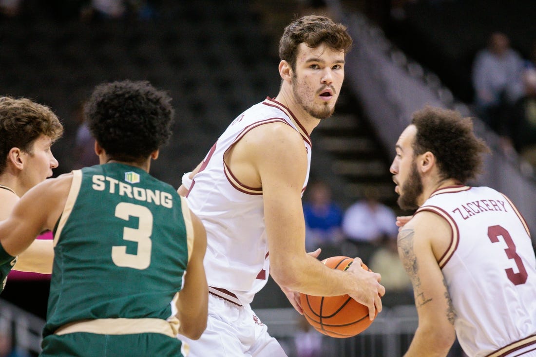 Nov 22, 2023; Kansas City, Missouri, USA; Boston College Eagles forward Quinten Post (12) looks to pass during the first half against the Colorado State Rams at T-Mobile Center. Mandatory Credit: William Purnell-USA TODAY Sports