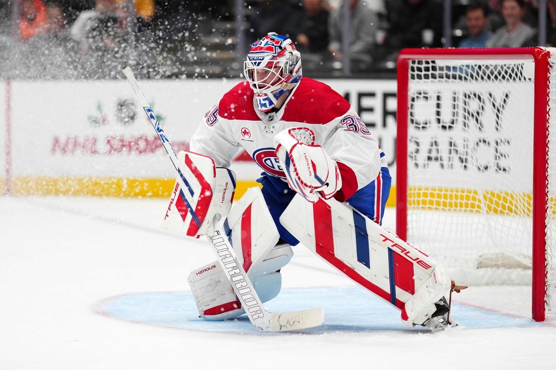 Nov 22, 2023; Anaheim, California, USA; Montreal Canadiens goaltender Sam Montembeault (35) defends the goal against the Anaheim Ducks in the second period at Honda Center. Mandatory Credit: Kirby Lee-USA TODAY Sports