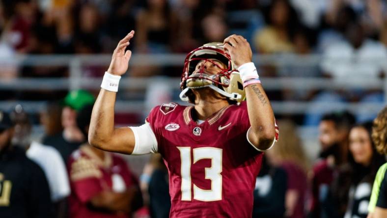 Nov 18, 2023; Tallahassee, Florida, USA; Florida State Seminoles quarterback Jordan Travis (13) during the warm ups before the game against the North Alabama Lions at Doak S. Campbell Stadium. Mandatory Credit: Morgan Tencza-USA TODAY Sports