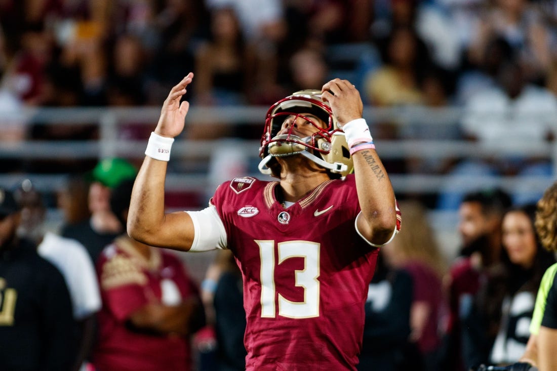 Nov 18, 2023; Tallahassee, Florida, USA; Florida State Seminoles quarterback Jordan Travis (13) during the warm ups before the game against the North Alabama Lions at Doak S. Campbell Stadium. Mandatory Credit: Morgan Tencza-USA TODAY Sports