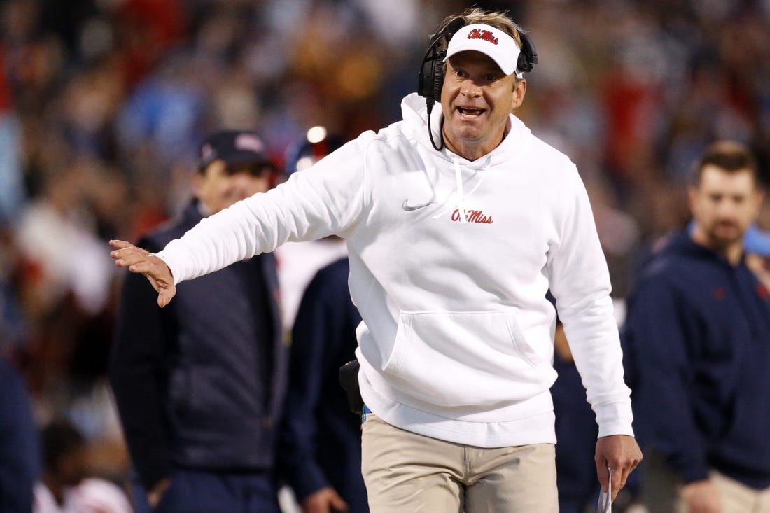 Nov 23, 2023; Starkville, Mississippi, USA; Mississippi Rebels head coach Lane Kiffin reacts during the second half  against the Mississippi State Bulldogs at Davis Wade Stadium at Scott Field. Mandatory Credit: Petre Thomas-USA TODAY Sports