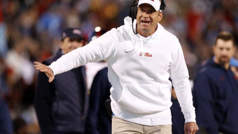 Nov 23, 2023; Starkville, Mississippi, USA; Mississippi Rebels head coach Lane Kiffin reacts during the second half  against the Mississippi State Bulldogs at Davis Wade Stadium at Scott Field. Mandatory Credit: Petre Thomas-USA TODAY Sports