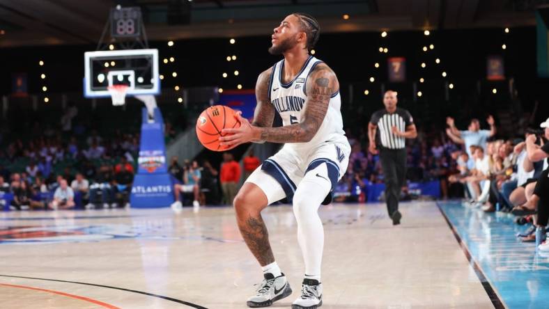 Nov 24, 2023; Paradise Island, BAHAMAS;  Villanova Wildcats guard Justin Moore (5) shoots during the first half against the Memphis Tigers at Imperial Arena. Mandatory Credit: Kevin Jairaj-USA TODAY Sports