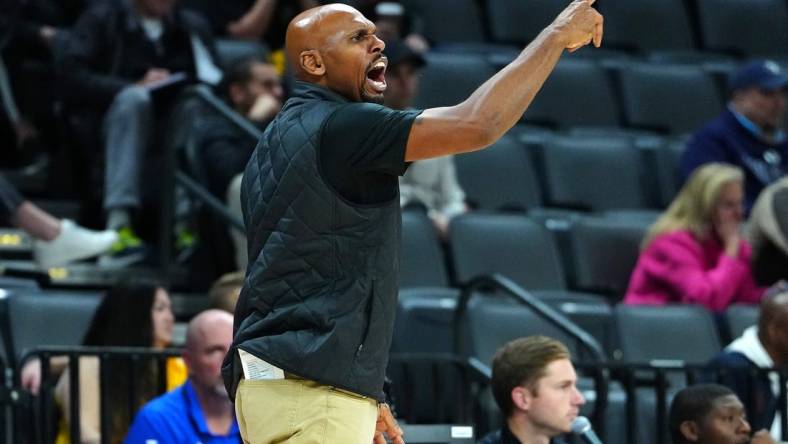 Nov 24, 2023; Las Vegas, NV, USA; Vanderbilt Commodores head coach Jerry Stackhouse argues a call in favor of the Arizona State Sun Devils during the first half at Michelob ULTRA Arena. Mandatory Credit: Stephen R. Sylvanie-USA TODAY Sports