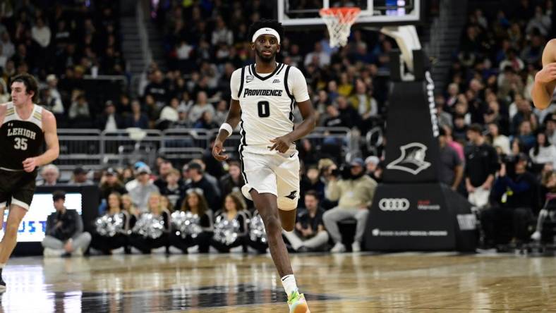 Nov 24, 2023; Providence, Rhode Island, USA; Providence Friars guard Davonte Gaines (0) runs up the court during the second half against the Lehigh Mountain Hawks at Amica Mutual Pavilion. Mandatory Credit: Eric Canha-USA TODAY Sports