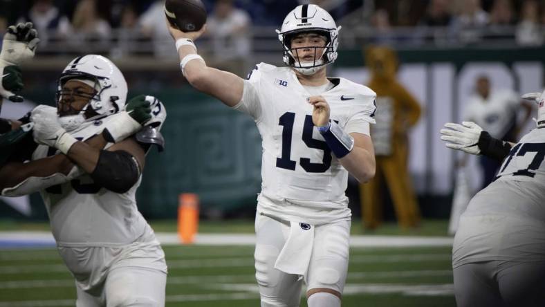 Nov 24, 2023; Detroit, Michigan, USA; Penn State Nittany Lions quarterback Drew Allar (15) passes the ball against the Michigan State Spartans during the second half at Ford Field. Mandatory Credit: David Reginek-USA TODAY Sports