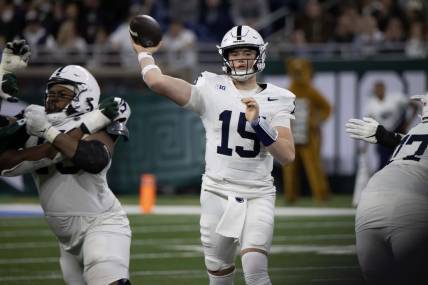 Nov 24, 2023; Detroit, Michigan, USA; Penn State Nittany Lions quarterback Drew Allar (15) passes the ball against the Michigan State Spartans during the second half at Ford Field. Mandatory Credit: David Reginek-USA TODAY Sports