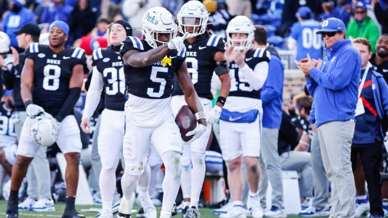 Nov 25, 2023; Durham, North Carolina, USA; Duke Blue Devils wide receiver Jalon Calhoun (5) celebrates a play  during the second half of the game against Pittsburgh Panthers at Wallace Wade Stadium.  Mandatory Credit: Jaylynn Nash-USA TODAY Sports