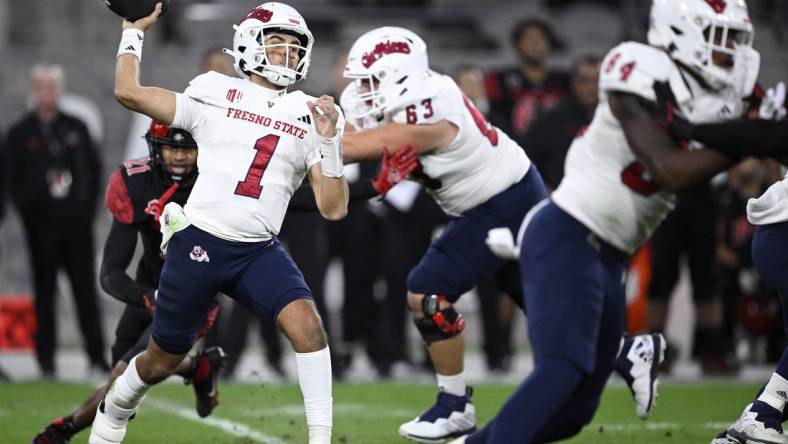 Nov 25, 2023; San Diego, California, USA; Fresno State Bulldogs quarterback Mikey Keene (1) throws a pass against the San Diego State Aztecs during the first half at Snapdragon Stadium. Mandatory Credit: Orlando Ramirez-USA TODAY Sports