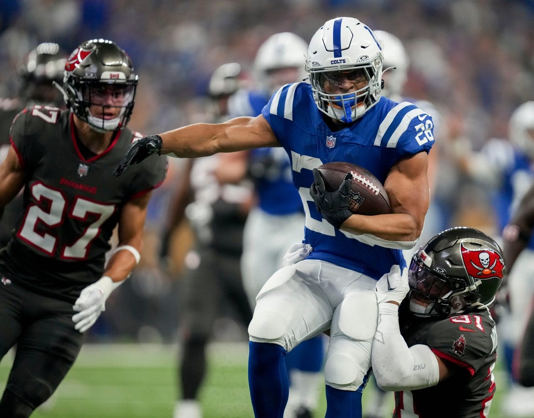 Indianapolis Colts running back Jonathan Taylor (28) rushes the ball Sunday, Nov. 26, 2023, during a game against the Tampa Bay Buccaneers at Lucas Oil Stadium in Indianapolis.