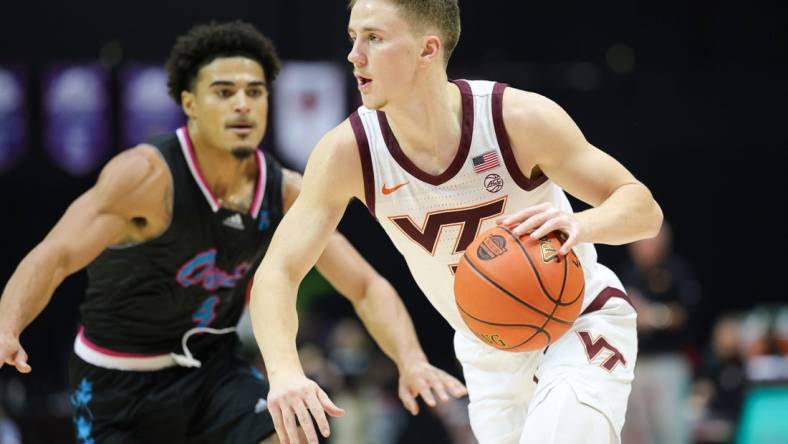 Nov 26, 2023; Kissimmee, FL, USA;  Virginia Tech Hokies guard Sean Pedulla (3) drives to the hoop against the Florida Atlantic Owls in the first half during the ESPN Events Invitational Championship game at State Farm Field House. Mandatory Credit: Nathan Ray Seebeck-USA TODAY Sports