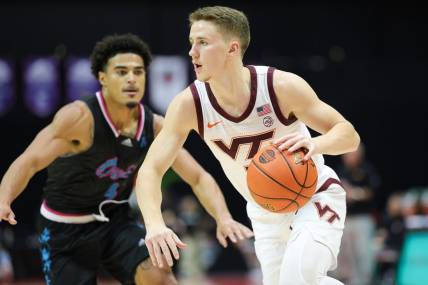 Nov 26, 2023; Kissimmee, FL, USA;  Virginia Tech Hokies guard Sean Pedulla (3) drives to the hoop against the Florida Atlantic Owls in the first half during the ESPN Events Invitational Championship game at State Farm Field House. Mandatory Credit: Nathan Ray Seebeck-USA TODAY Sports