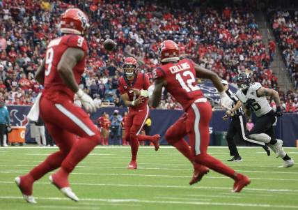 Houston Texans quarterback C.J. Stroud (7) throws a touchdown pass to  wide receiver Nico Collins (12) against the Jacksonville Jaguars in the second half at NRG Stadium. Mandatory Credit: Thomas Shea-USA TODAY Sports