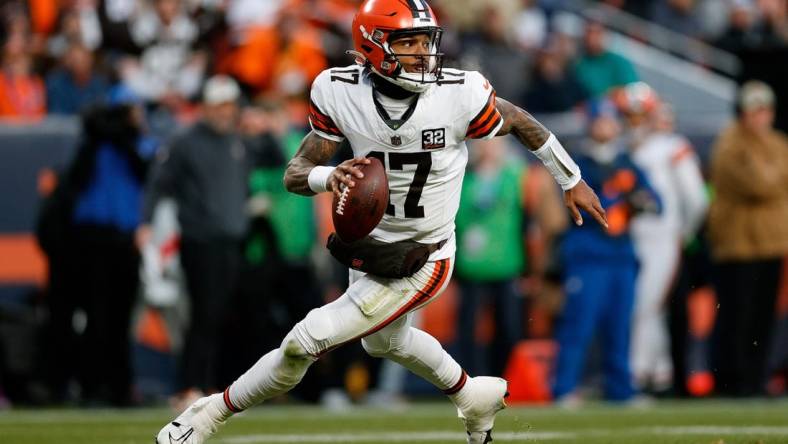 Nov 26, 2023; Denver, Colorado, USA; Cleveland Browns quarterback Dorian Thompson-Robinson (17) scrambles in the backfield in the third quarter against the Denver Broncos at Empower Field at Mile High. Mandatory Credit: Isaiah J. Downing-USA TODAY Sports